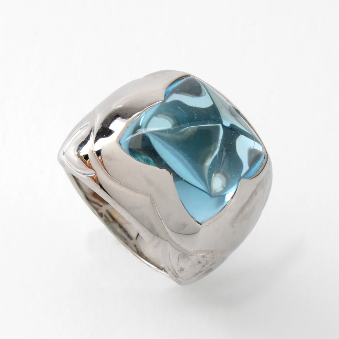 Bulgari Topaz 18K Ring: Vintage Bulgari Blue Topaz and 18 Karat White Gold Ring. Signed, stamped 750. Ring size 4-3/4. Approx. weight: 16.20 grams. Kodner Galleries offers phone and absentee bidding at a low, flat 21%