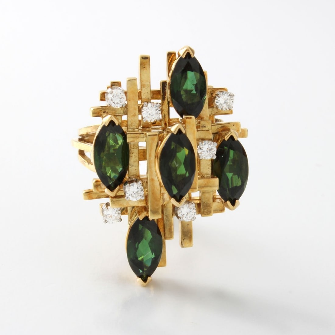 Henry Dunay Tourmaline & Diamond Ring: Vintage Henry Dunay Marquise Cut Green Tourmaline, Round Brilliant Cut Diamond and 18 Karat Yellow Gold Ring. Tourmalines with vivid color. Diamonds E-F color, VS clarity. Signed, stamped 18K. Ring