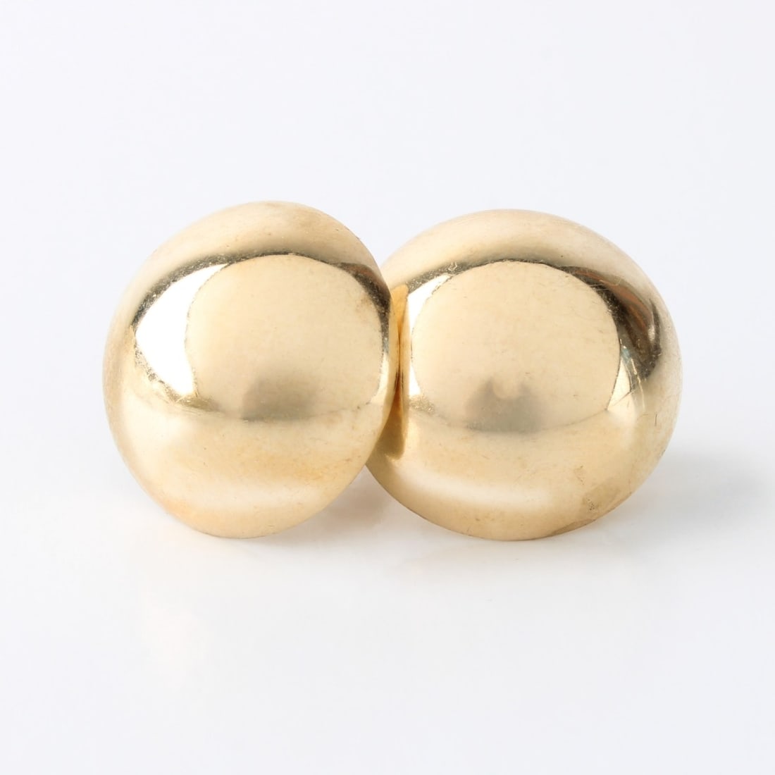 14K Earrings: Vintage 14 Karat Yellow Gold (hollow) Dome Earrings. Measure 11/16" diameter. Approx. weight (without post backs): 3.69 grams. Kodner Galleries offers phone and absentee bidding at a low, flat 21%