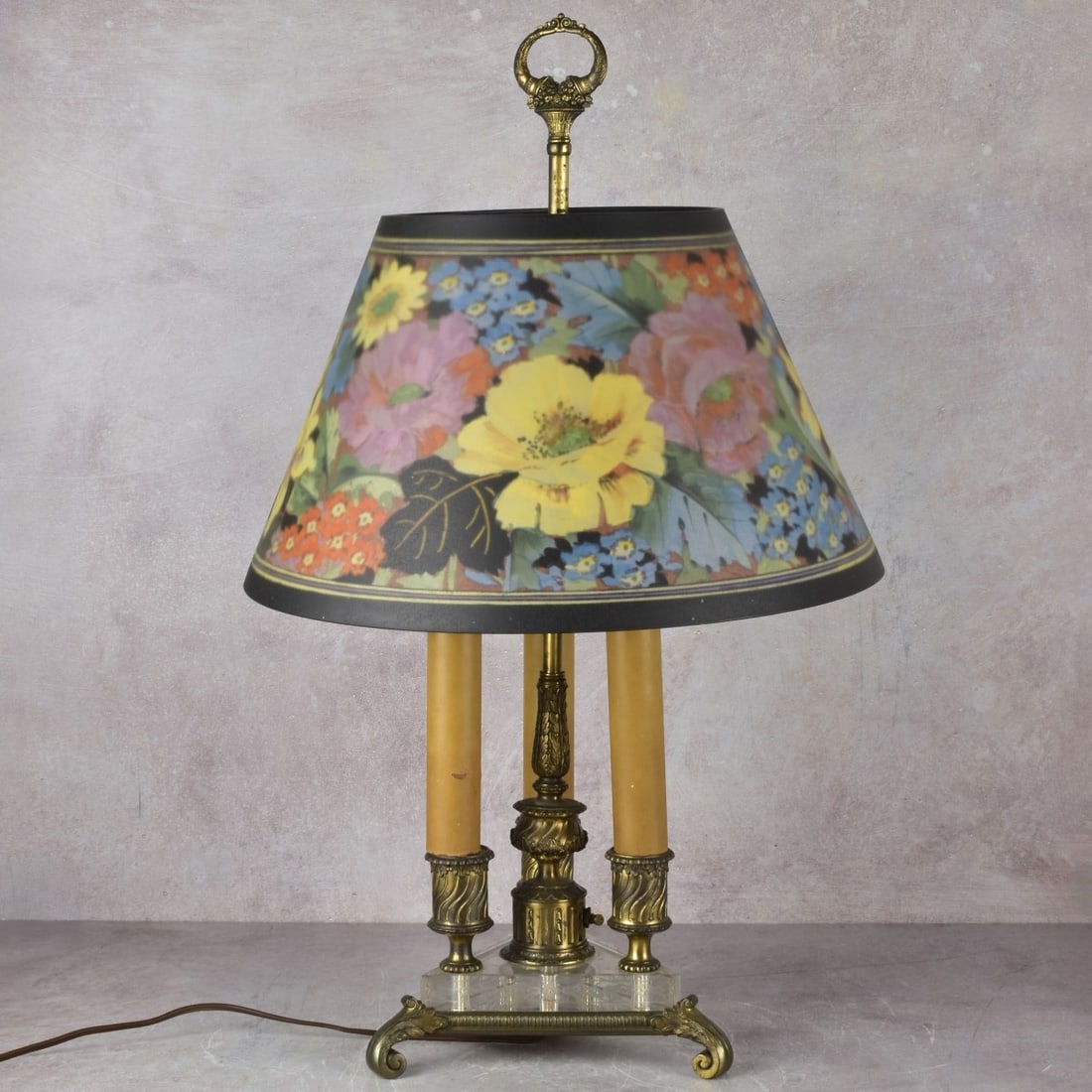 American Pairpoint Lamp: American Pairpoint Reverse Painted Flower Lampshade with Three Light Bronze Base. Omolou and glass classical base on three scrolled feet marked with company monogram and "PAIRPOINT E 3011" to the