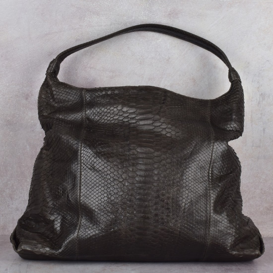 Vintage Snakeskin Shoulder Bag: Vintage Dark Brown Soft Snakeskin Shoulder Bag. Measures: 13" high, 17" wide, 3-1/2" wide, drop measures: 9-1/2" high. Kodner Galleries offers phone and absentee bidding at a low, flat 21% buyer’s
