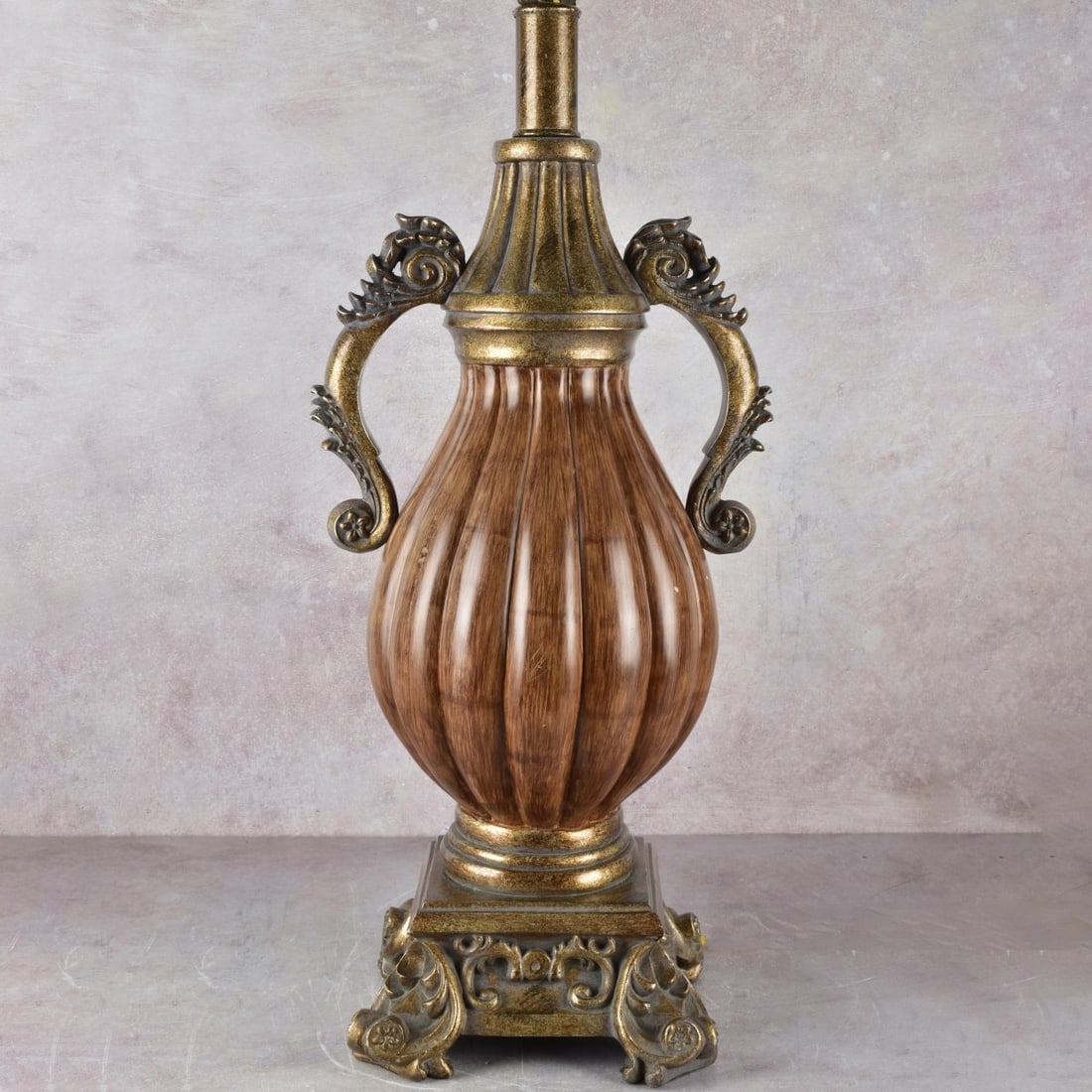 Large Gourd Shape Lamp: Large Gourd Shape Pottery Table Lamp Supported on Four (4) Scrolled Feet and Attached Handles. Gourd with base measures: 22" high, end of handle to end of handle measures: 11-1/2" wide, 8-1/4" deep. K