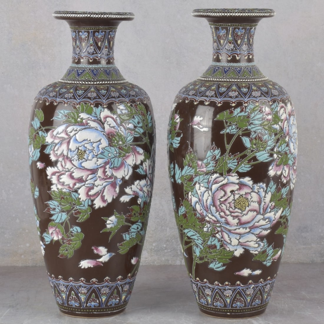 Chinese Black Famille Noire Vases: Pair of Vintage Chinese Black Gloss Famille Noire Vases with a Flared Top Rim Decorated with Large White Chrysanthemums. Measures: 17: high, 6-1/4" diameter. Kodner Galleries offers phone and