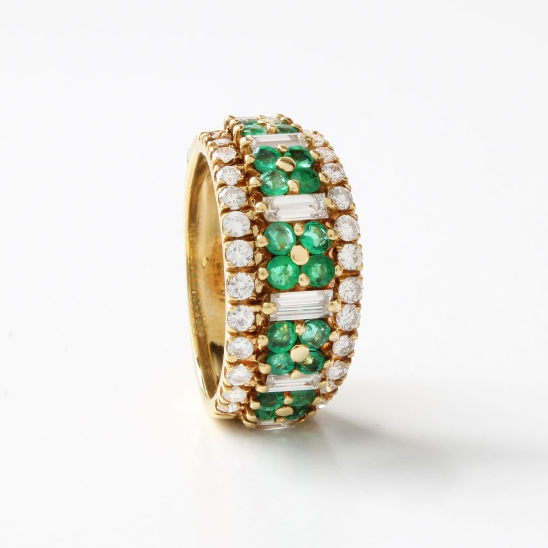 Tiffany & Co Diamond and Emerald Ring: Fine Quality Vintage Italian for Tiffany & Co Approx. 1.25 Carat Round Brilliant and Baguette Cut Diamond, .85 Carat TW Round Cut Emerald and 18 Karat Yellow Gold Band / Ring. Diamonds E-F color,
