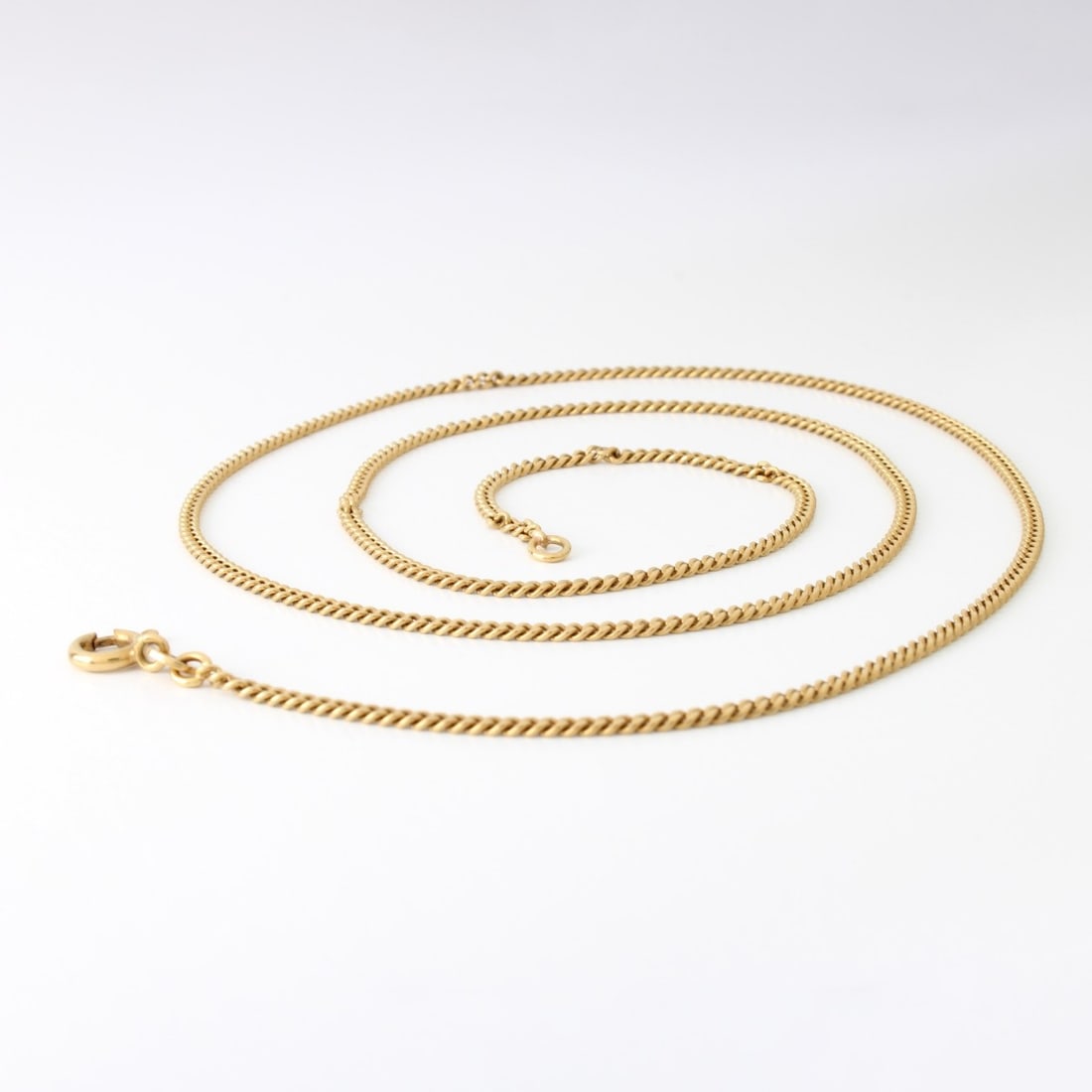 18K Necklace: Vintage Italian 18 Karat Yellow Gold Chain/Necklace. Stamped Italy 750. Measures 24" L. Approx. weight: 10.89 grams. Kodner Galleries offers phone and absentee bidding at a low, flat 21% buyer’s
