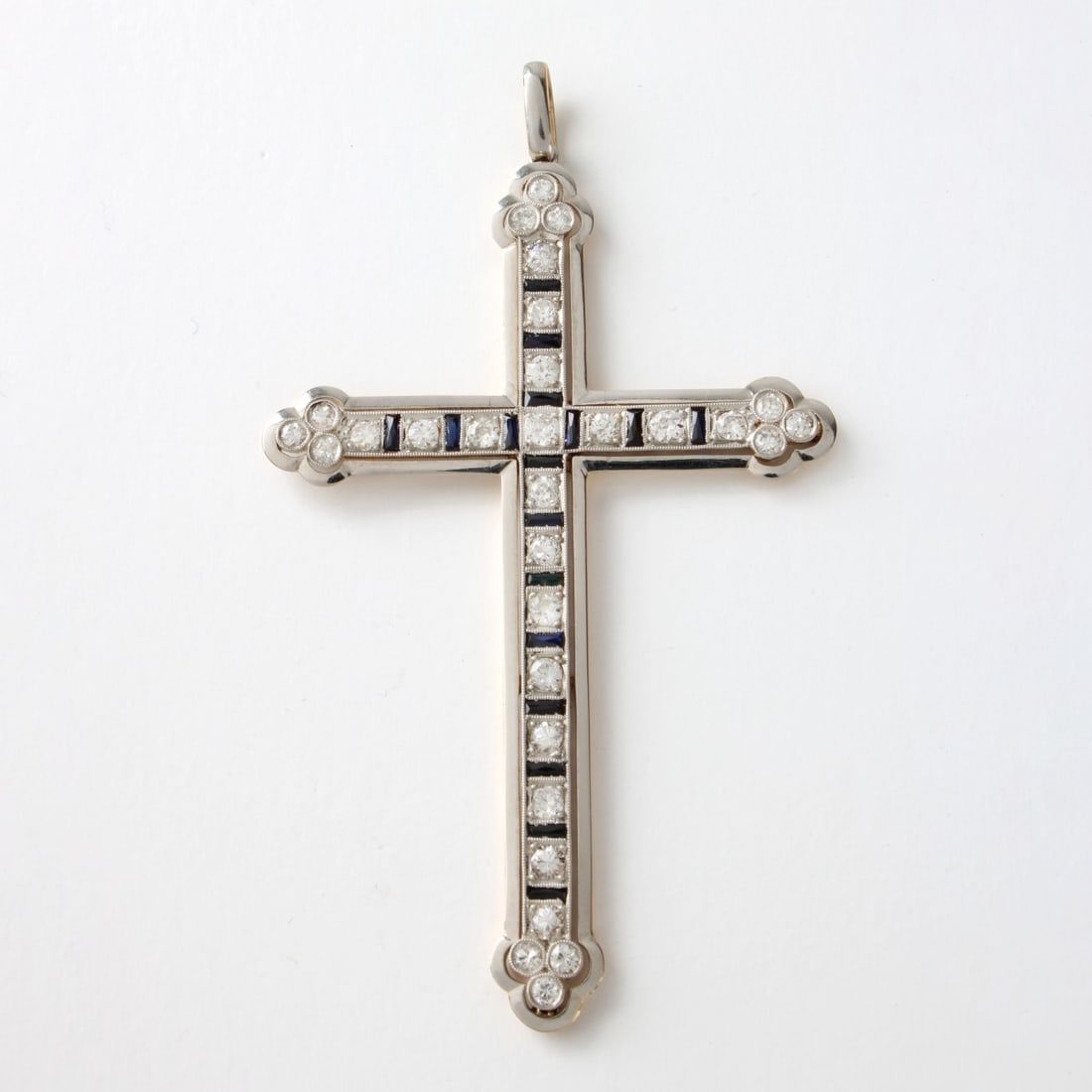 Diamlnd, Sapphire, Plat. &18K Pendant: Vintage Round Brilliant Cut Diamond, Baguette Cut Sapphire, Platinum and 18 Karat Yellow Gold Cross Pendant. Diamonds G-H color, VS clarity. Measures 3-1/8" L, 1-7/8" W. Approx. weight: 10.90 grams.