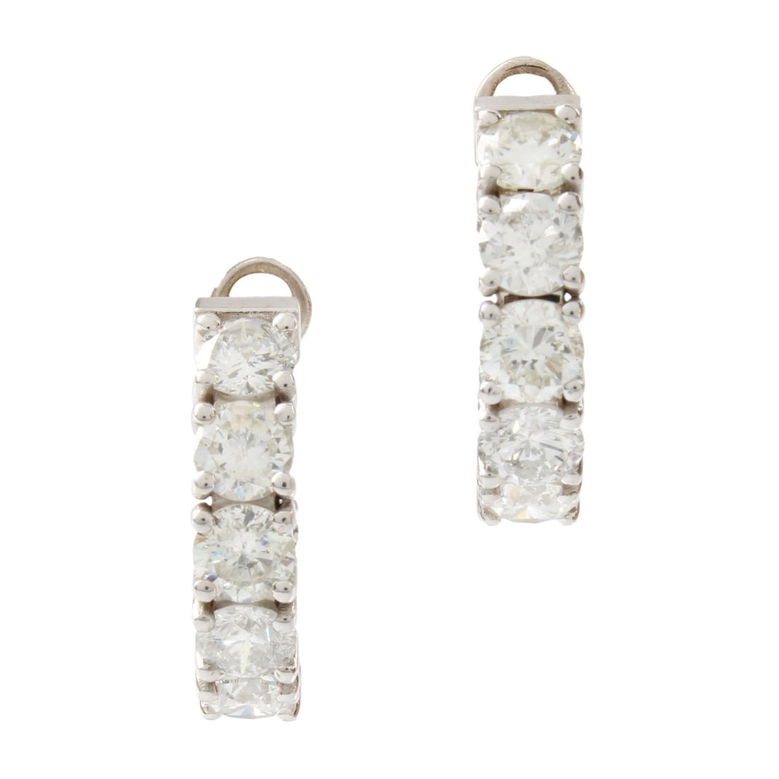 Diamond and 14K Hoop Earrings: Vintage Approx. 6.30 Carat TW Sixteen Round Brilliant Cut Diamond and 14 Karat White Gold In and Out Hoop Earrings. Diamonds G-H color, VS-SI clarity. Measure 7/8" diameter. Approx. weight: 6.95 grams