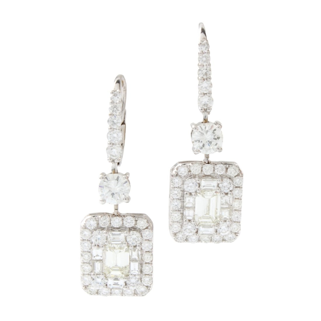 Diamond and 18K Earrings: Fine Quality Approx. 5.75 Carat TW Emerald Cut and Round Brilliant Cut Diamond and 18 Karat White Gold Pendant Earrings. Diamonds E-F color, VS clarity. Measure 1-1/2" L, 1/2" W. Approx. total