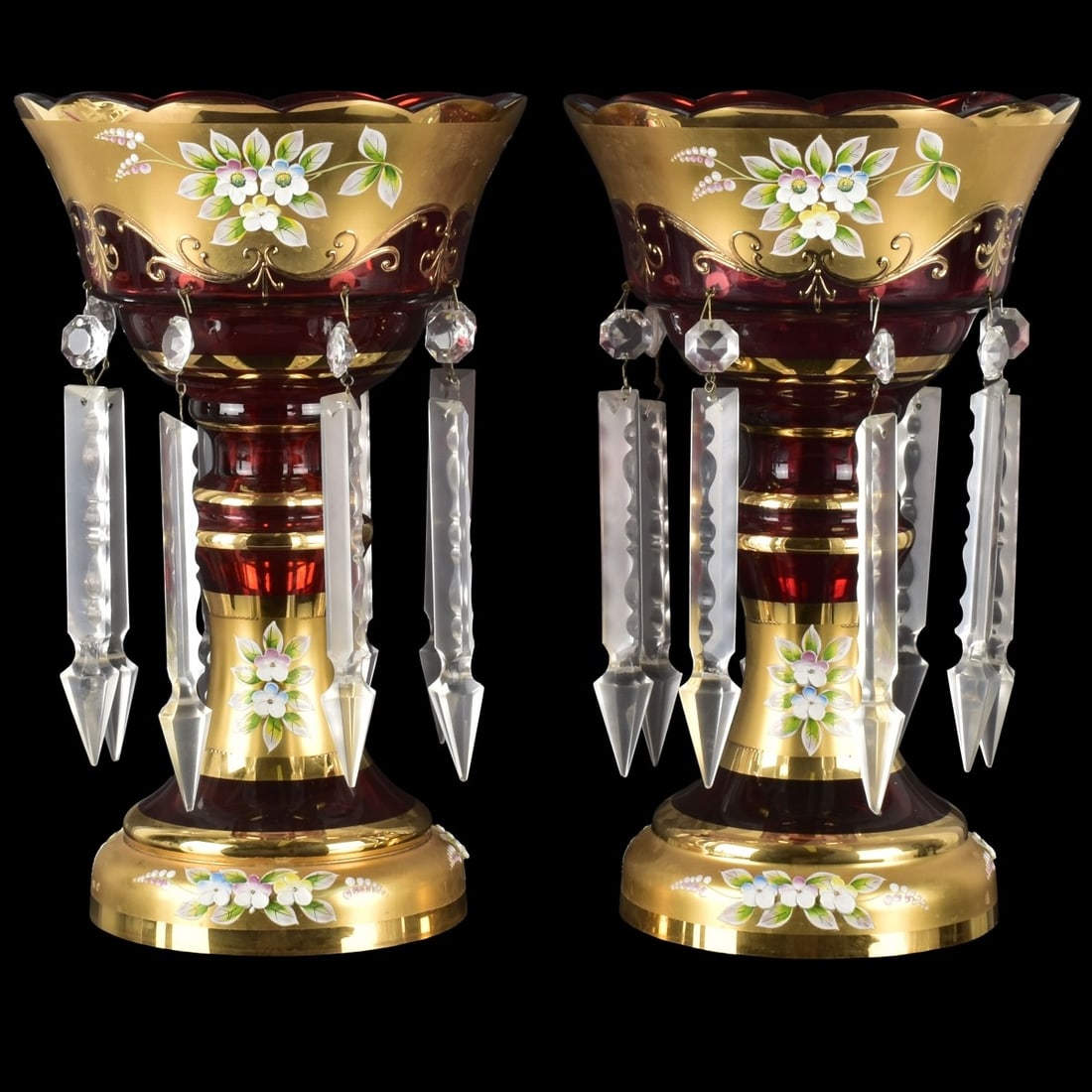 Bohemian Crystal Lusters: Vintage Pair of Bohemian Ruby Cranberry Red Glass Mantle Lusters with Etched Prisms and Enameled Painted Flowers. Measures: 12-3/4" high, 8" diameter. Kodner Galleries offers phone and absentee biddin