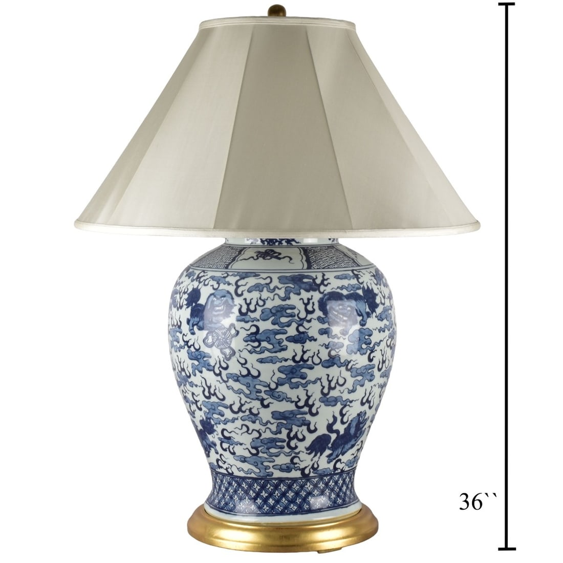 Ralph Lauren Lamp: Ralph Lauren Hand Painted Foo Dog Blue and White Porcelain Two Light Lamp. Plate marked Ralph Lauren to bottom of base. Large shade included. Overall measures: 36" high, 13-1/3" diameter. Shade measur