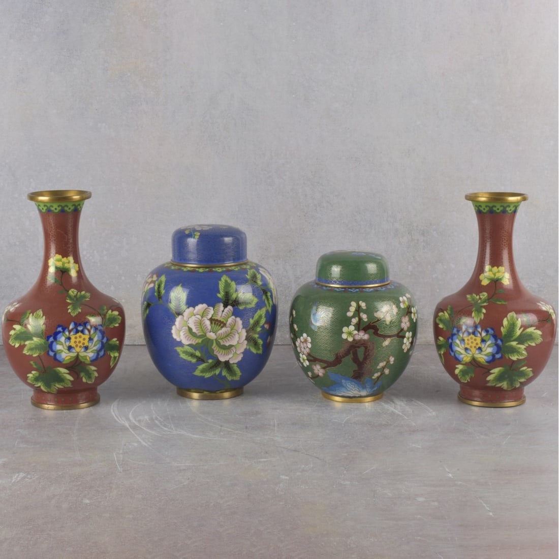 Vintage Japanese Cloisonne: Vintage Japanese Cloisonne Pieces. Including two (2) ginger jars, one decorated with cherry blossoms and small bird on a green ground, measures: 6-1/2" high, 6" wide, one decorated with large pink and
