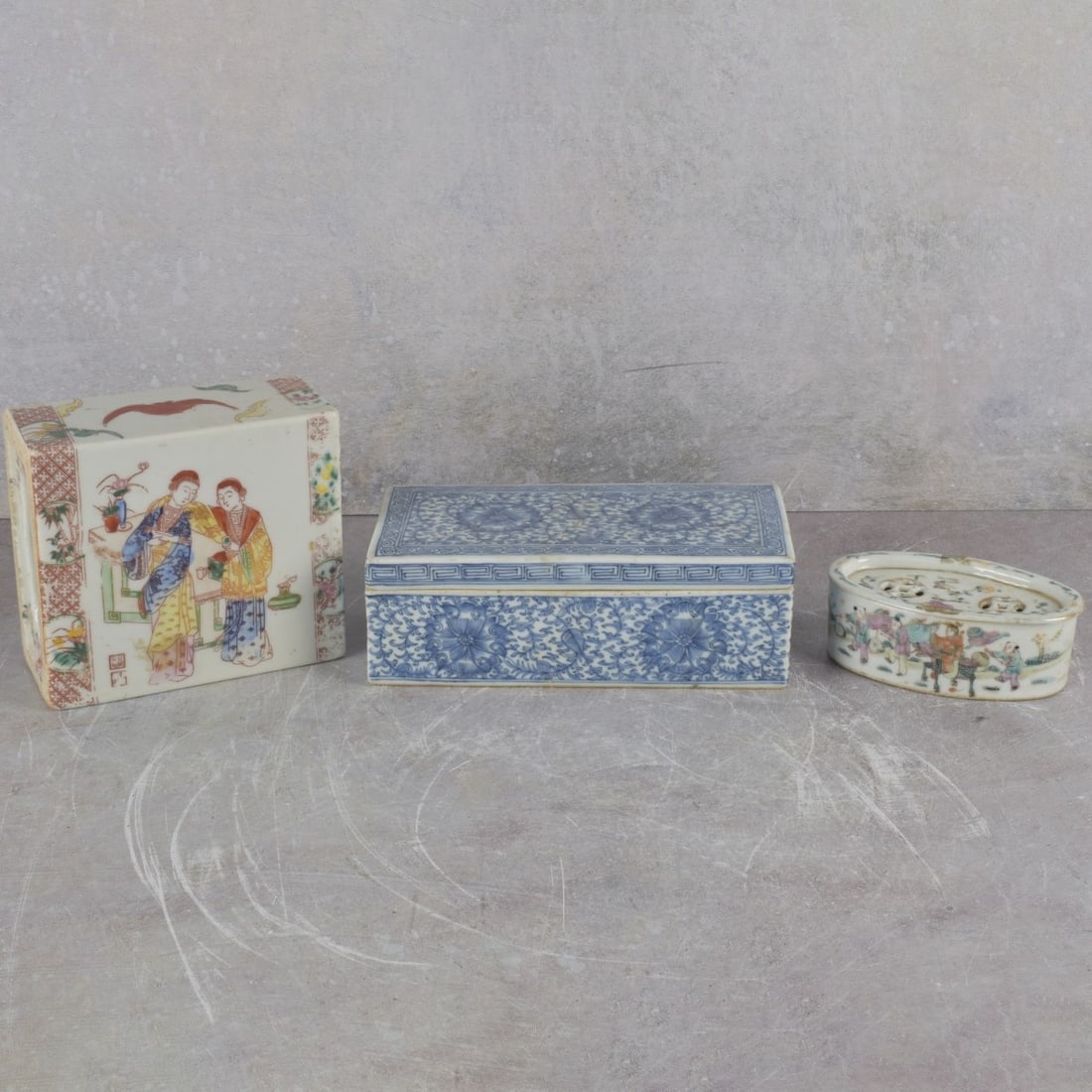 Antique Chinese Porcelain Pieces: Three (3) Antique Chinese Porcelain Pieces. Consisting of one (1) Chinese famille verte neck pillow, measures: 5" high, 5-1/2" wide, 2-1/2" deep, one (1) Chinese blue and white divided rectangular