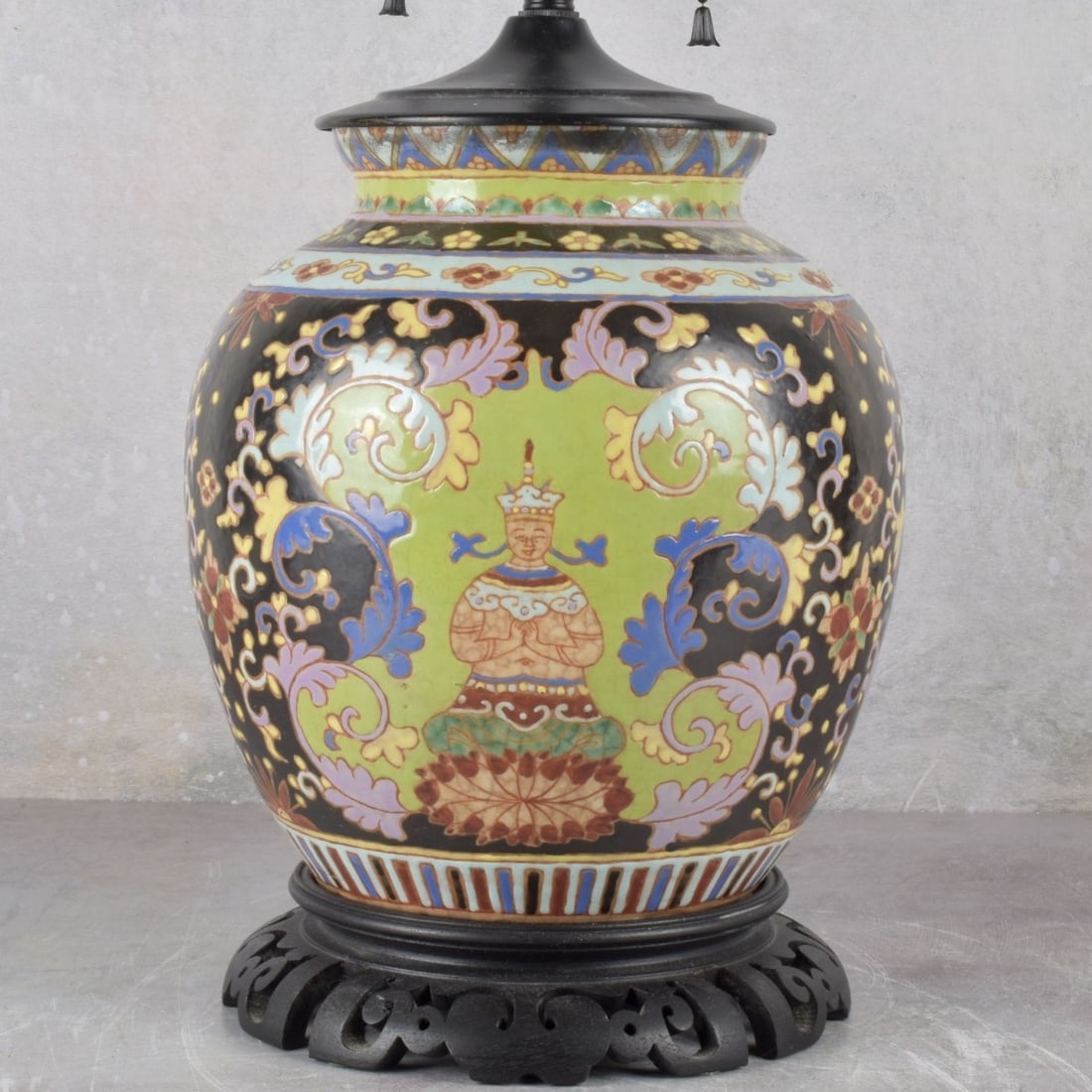 Chinese Vintage Ceramic Lamp: Vintage Chinese Porcelain Two (2) Light Hand Painted Table Lamp. Decorated with colorful hand painted floras and noble court figures against a black ground.. Overall measures: 24" high, 8-1/2"