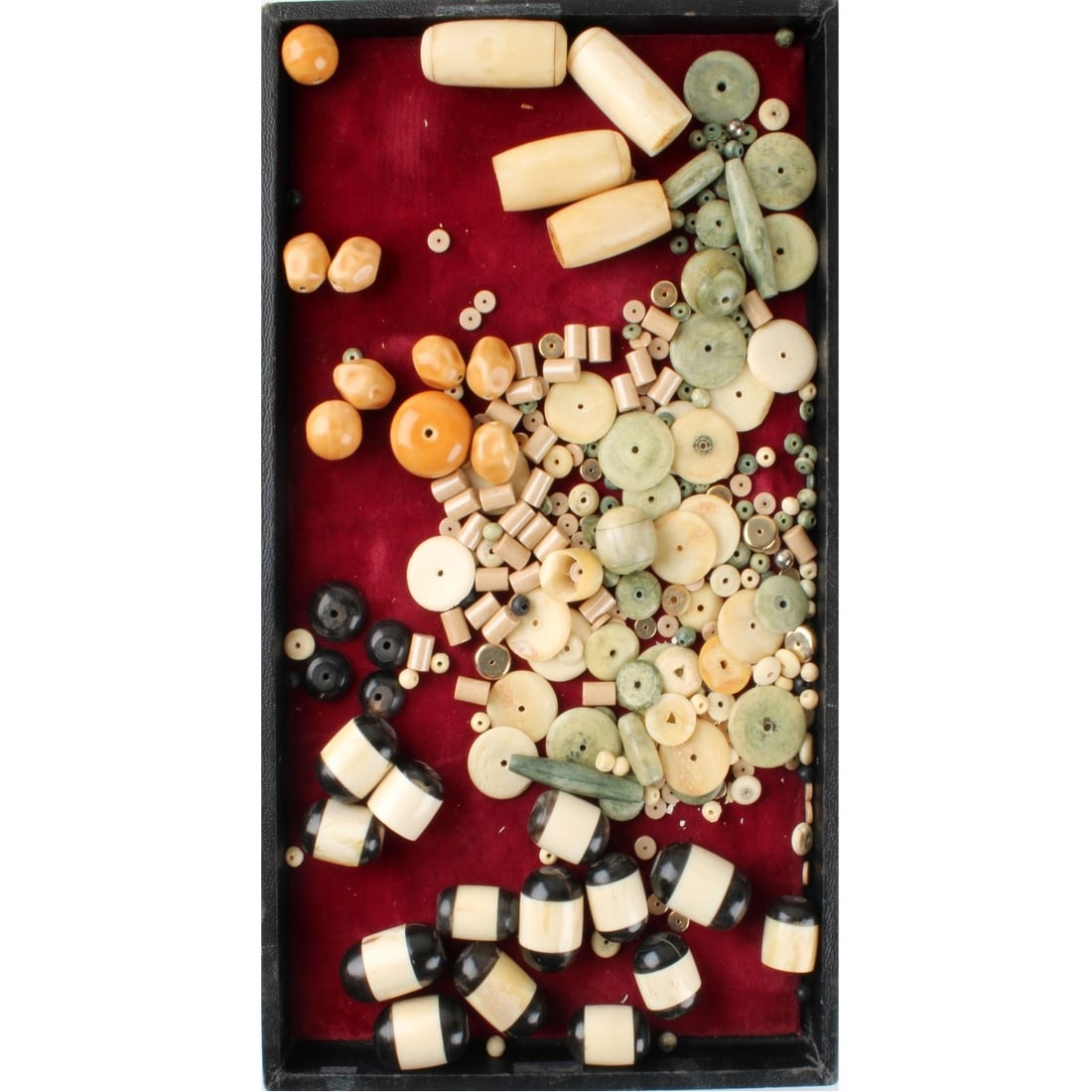 Jewelry Beads: Tray Lot of Jewelry Beads. To include bone, horn, porcelain and stone. Various sizes and shapes. Kodner Galleries offers phone and absentee bidding at a low, flat 21% buyer’s premium without