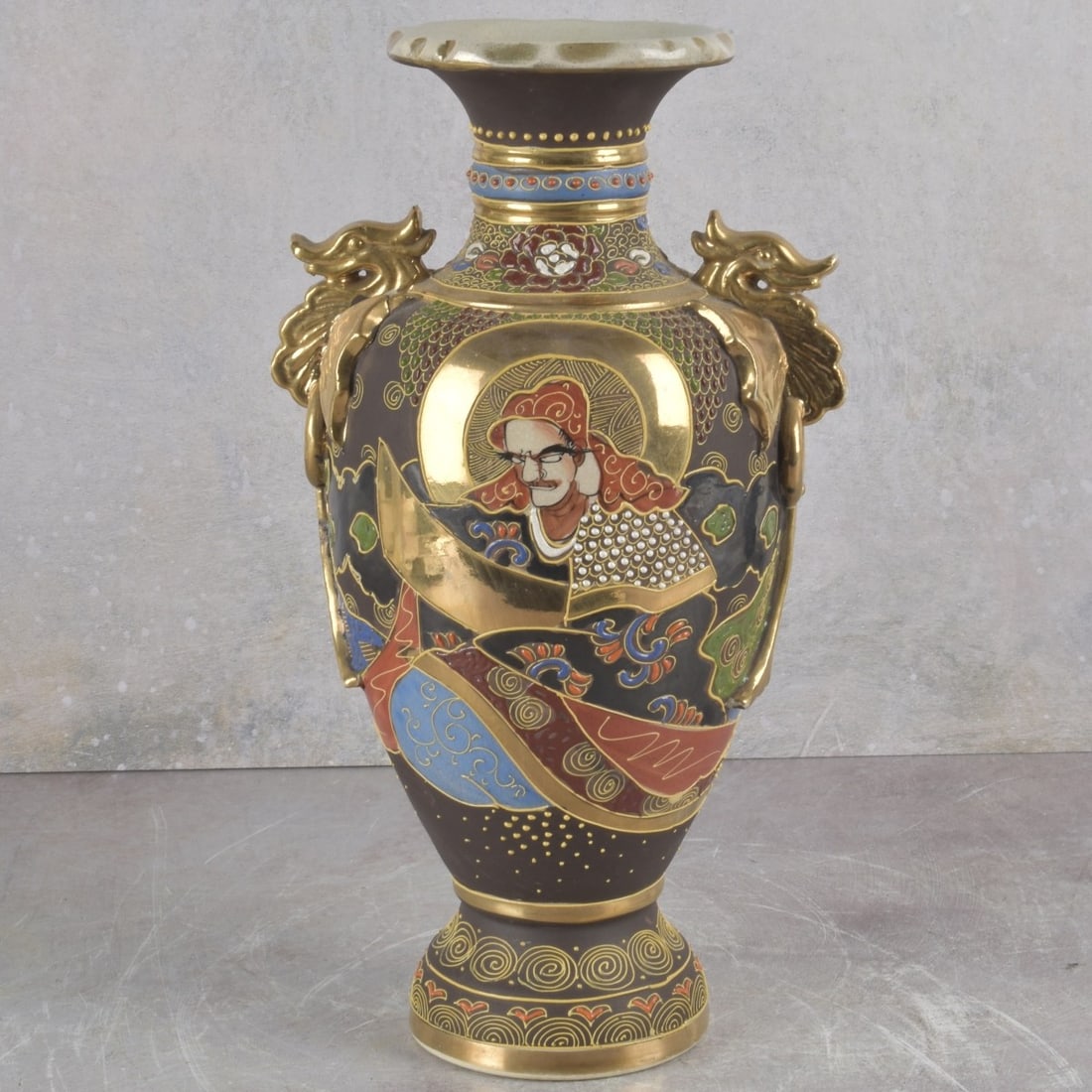 Japanese Satsuma Porcelain Vases: Two (2) Japanese Satsuma Porcelain Vases. Late 20th century. Tallest measures: 12-1/4" high, 6" diameter, shortest measures: 10" high, 5-1/2" diameter. Kodner Galleries offers phone and absentee