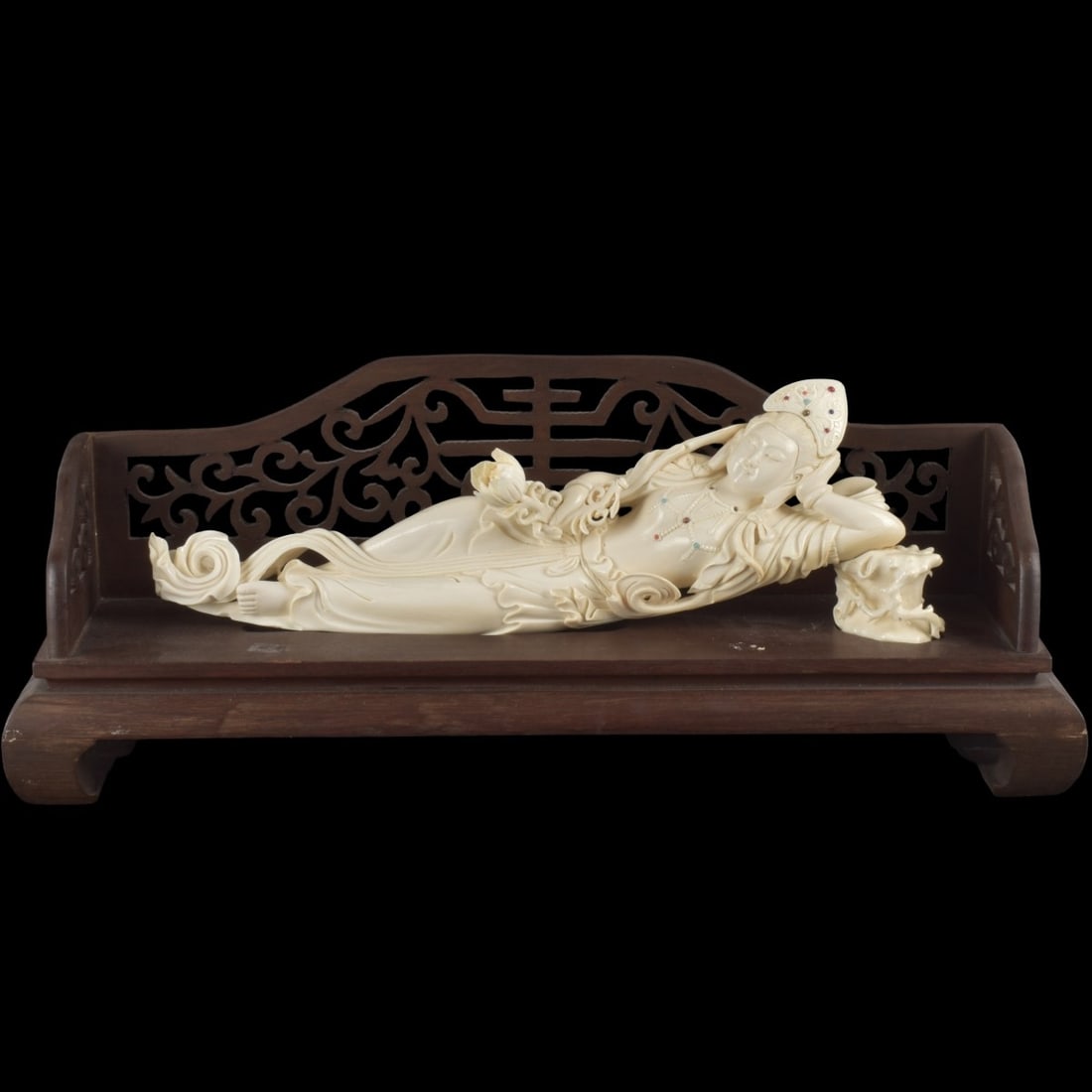 Vintage Reclining Chinese Empress: Vintage Reclining Chinese Carved Organic Material Empress Sculpture Holding a Large Lotus Blossom with Inset Stones Set on a Carved Wood Bench. Sculpture measures: 14" long, 4-3/4" high, 2-7/8" deep.W