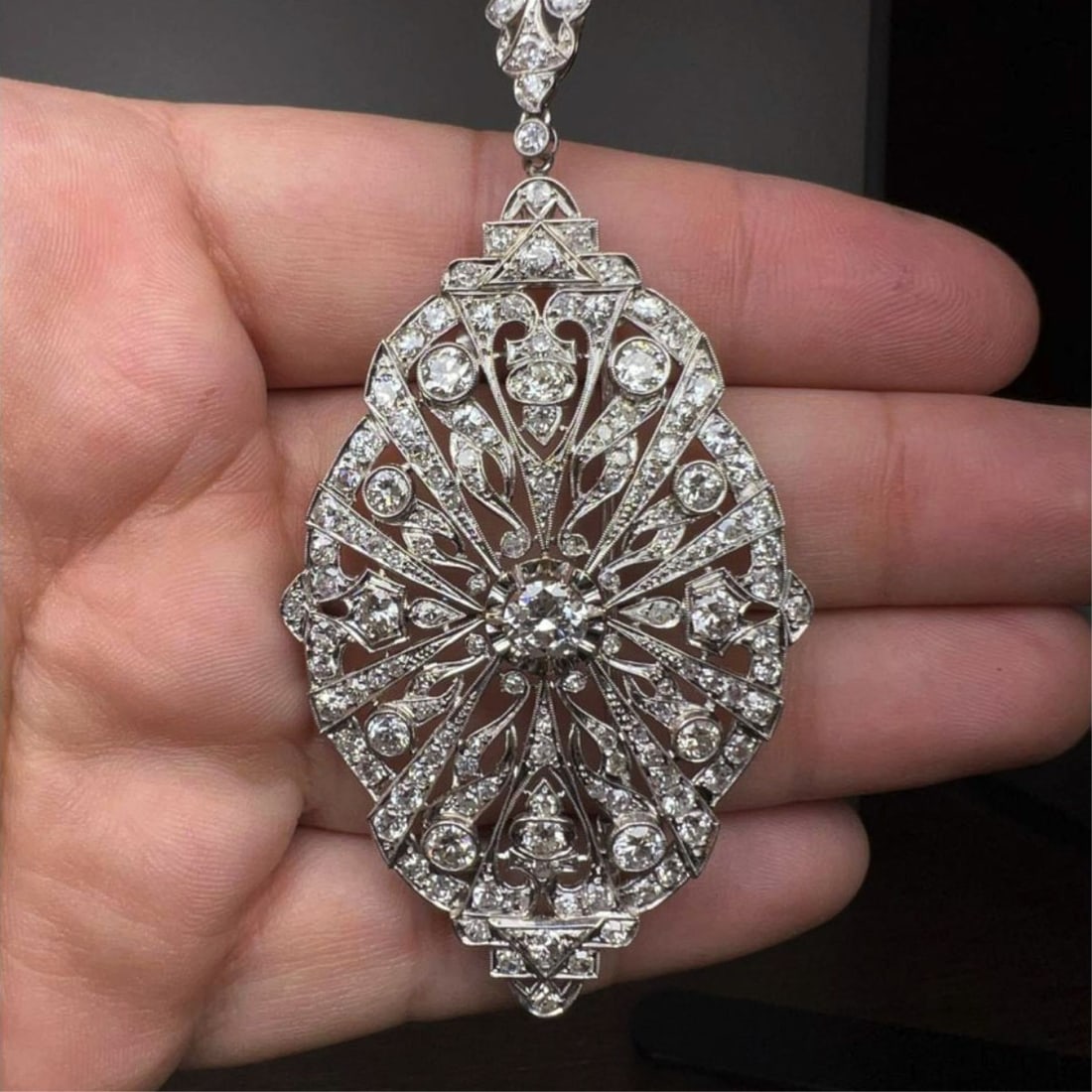 Deco Diamond and Plat Necklace: Art Deco Approx. 21.85 Carat TW Diamond and Platinum Pendant Necklace. Set in the center with an approx. .85 carat old European cut diamond, E-F color, SI1 clarity and accented throughout with