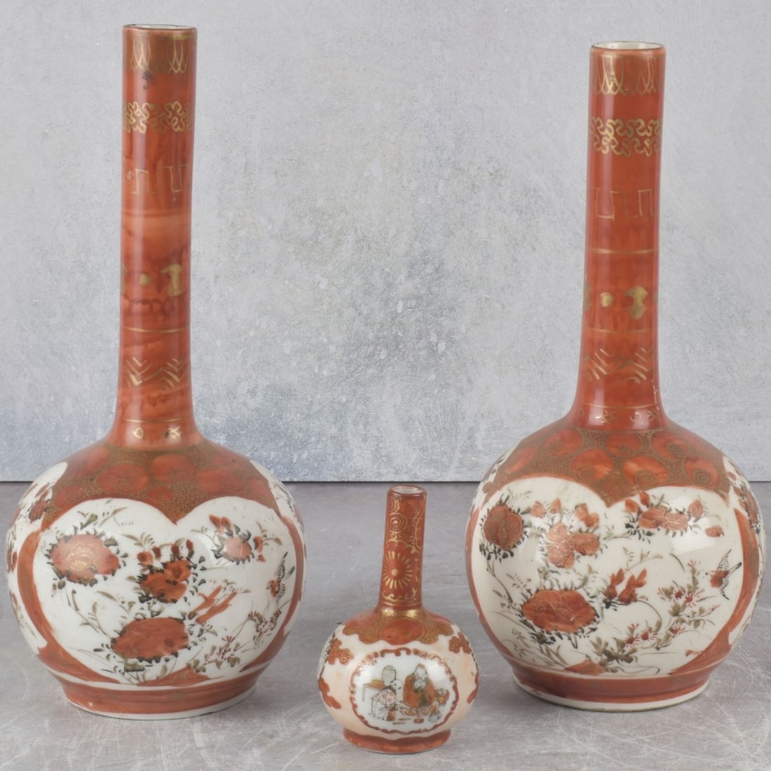 Vintage Japanese Satsuma Vases: Three (3) Vintage Japanese Satsuma Porcelain Vases. Tallest measures: 9-1/2" high, 3-3/4" diameter, smallest measures: 3-3/8" high, 2-1/8" diameter. Kodner Galleries offers phone and absentee bidding