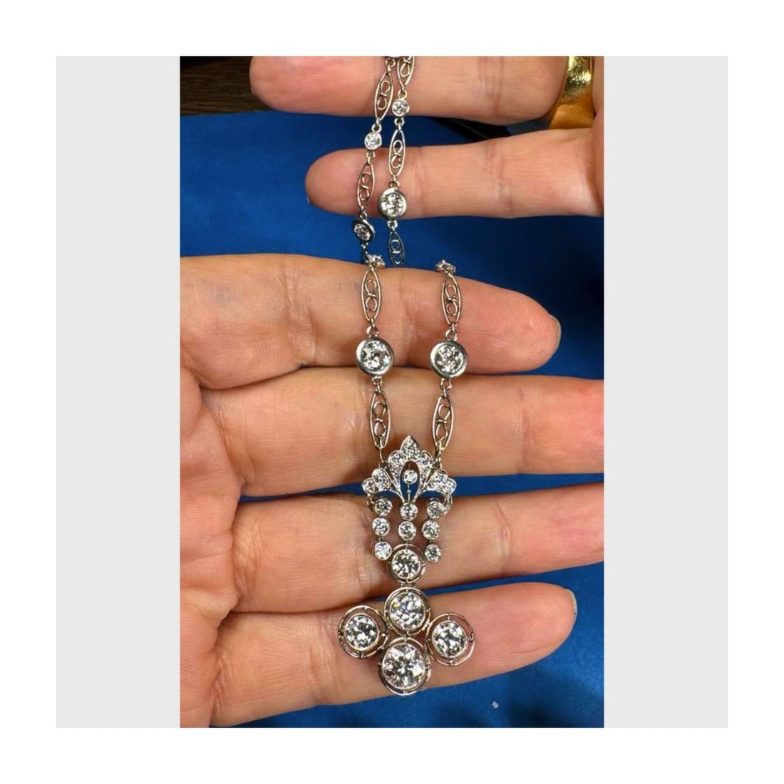 Deco Diamond and Plat. Necklace: Art Deco Approx. 8.25 Carat TW Forty Old Mine Cut Diamond and Platinum Pendant Necklace. Diamonds F-I color, VS1-SI1 clarity. Measures 15" L. Approx. weight: 14.0 grams. Condition: Very good condition