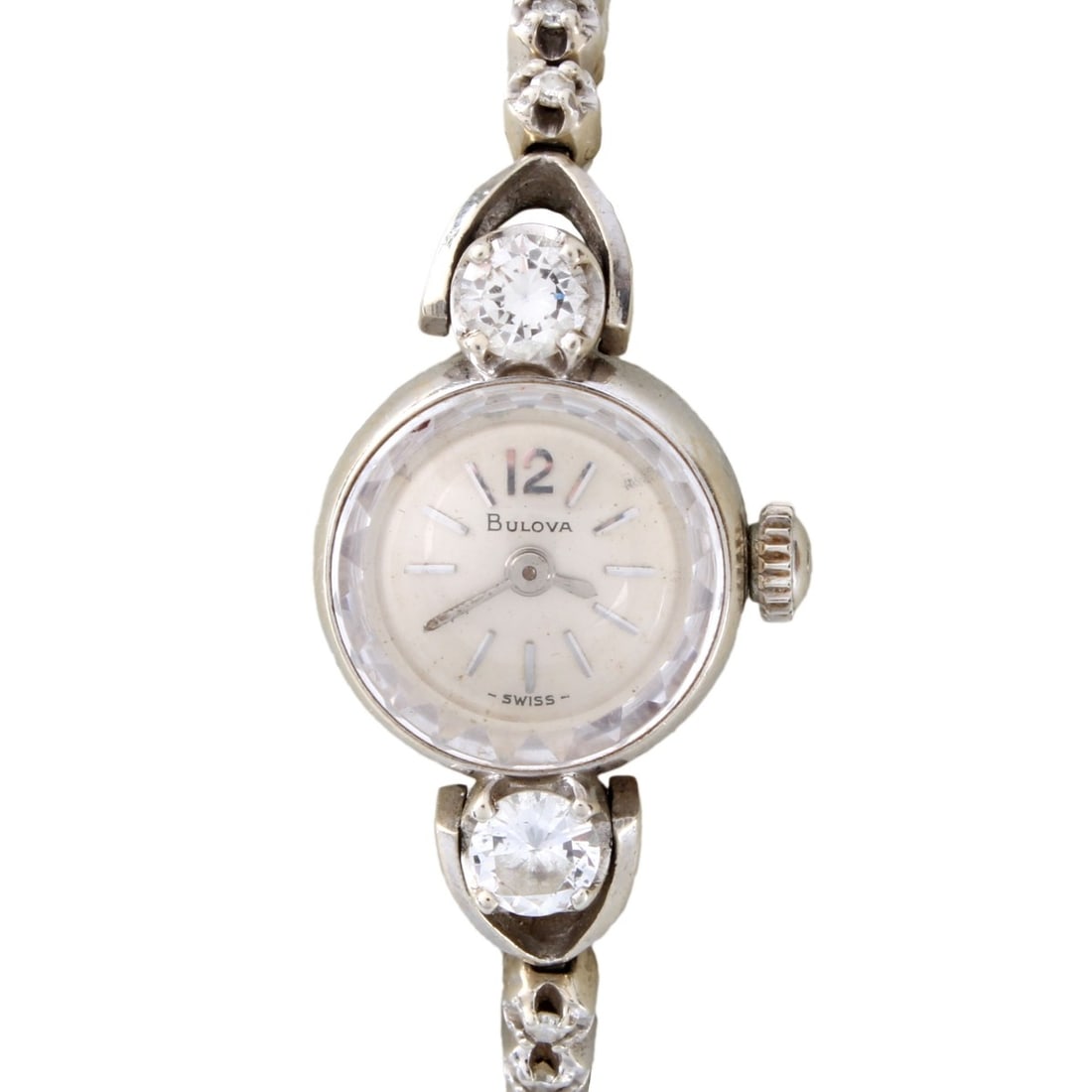 Lady's Bulova Diamond and 14K Watch: Lady's Vintage Bulova 14 Karat White Gold Bracelet Watch Accented with Approx. .60 Carat Two Round Brilliant Cut Diamonds. Manual wind movement. Case measures 15mm diam. Case back signed 14K, Bracelet