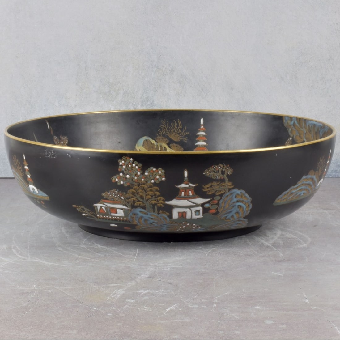 Large Spode Bowl: Large English Spode Bowl with a Japanese Painted Landscape. Properly marked to the bottom. Measures: 4-1/2" high, 14-1/2" diameter. Kodner Galleries offers phone and absentee bidding at a low, flat