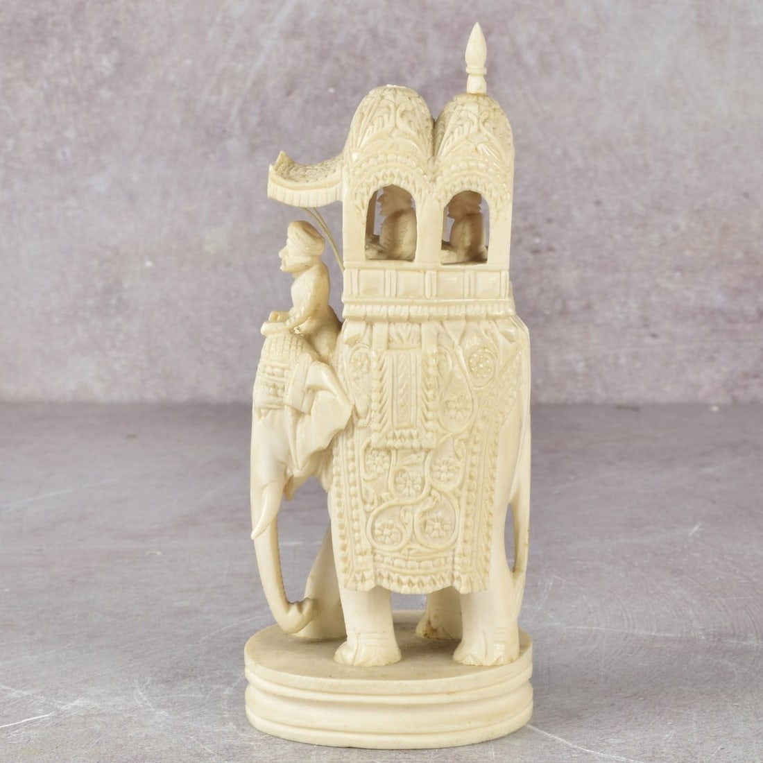 Indian Carving of an Elephant with Howdah: Antique Indian Carving of a Figure of an Elephant with a Howdah. Unsigned. Measures: 4-7/8" high, 2-1/8" wide, 1-3/4" deep. We Will Not Ship This Item Outside of the State of Florida. Anyone Having