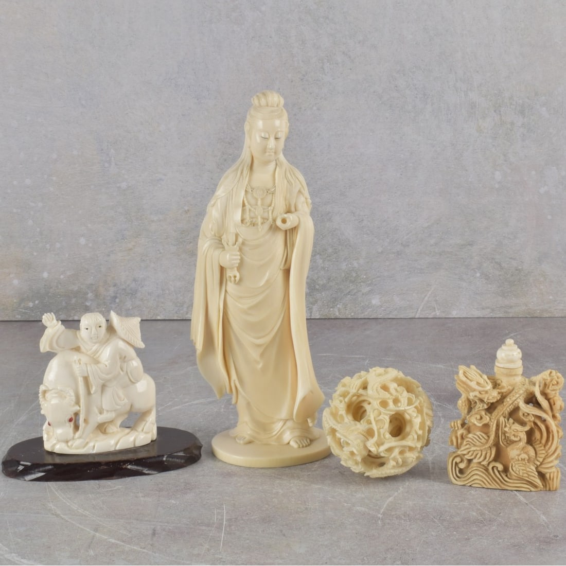 Collection of Asian Carvings: Collection of Four (4) Vintage Asian Organic Material Carvings. Consisting of one (1) puzzle ball, measures: 2-1/8" diameter, one (1) snuff bottle, artist signed, measures: 2-3/4" high, 2" wide, 1" de