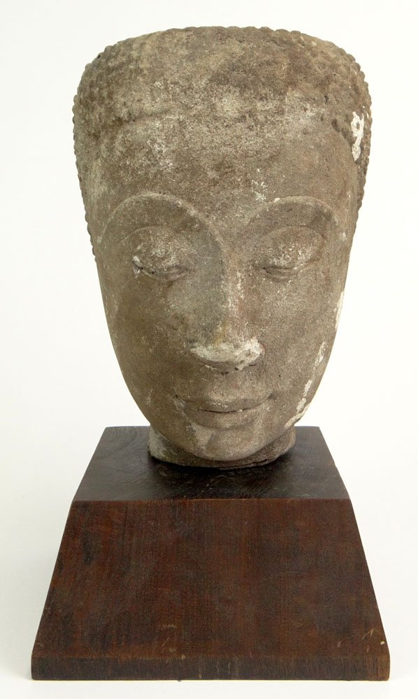15th Century Or Latter Thai Ayuthia-Style Carved Stone: 15th Century or Latter Thai Ayuthia-style Carved Stone Buddha Head with Flat Head and with Wood Base. Unsigned. Losses and Wear to Surfaces Consistent with Age. Measures 9 Inches Tall and 6-1/4 Inches