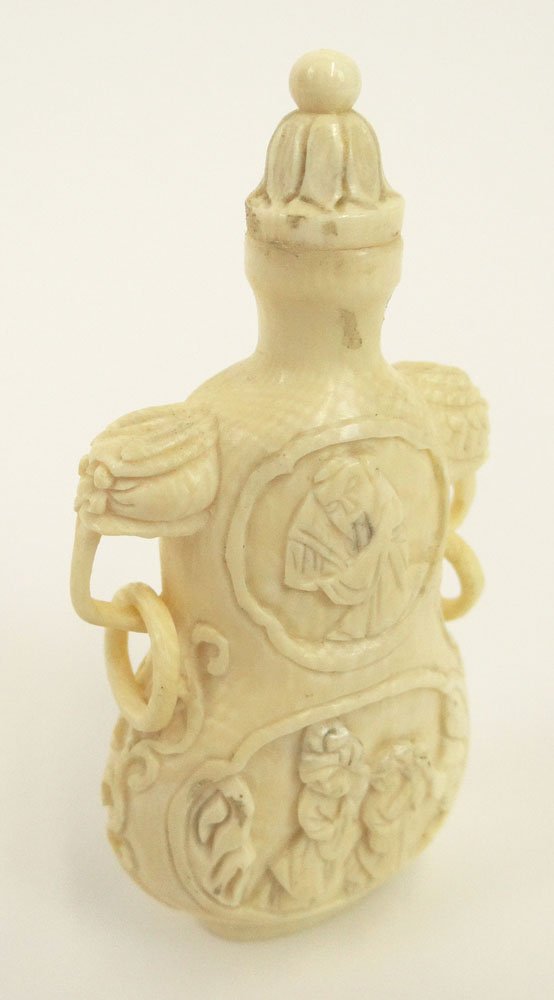 20th Century Chinese Carved Crosshatched Ivory Snuff Bo: 20th Century Chinese Carved Crosshatched Ivory Snuff Bottle with Carved Ring Handles Carved in the Shape of a Double Gourd with Matching Lotus Stopper and Splayed Foot. Signed. Good to Very Good Condi