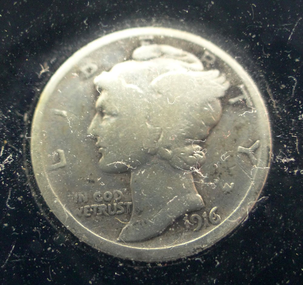 1916-D Mercury Dime. This is one of the most Counterfei: 1916-D Mercury Dime. This is one of the most Counterfeited Coins in Existence. Mounted in a Coin Holder Between Two (2) Pieces of Lucite. Because of the Rarity of this Coin, We are Assuming this is on