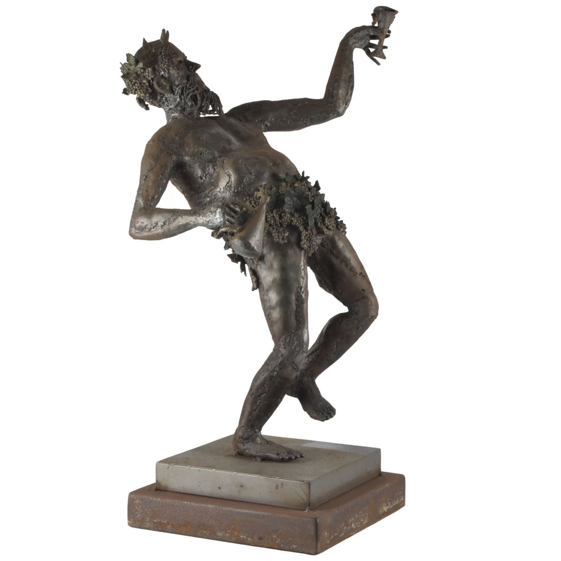 Jorge Carnino "The God Discovers Wine": Jorge Carnino "The God Discovers Wine" Modern Sheet Metal Sculpture Depicting Bacchus: The Roman God of Wine. Figure measures: 26-3/4" high, 14-1/2" wide, 16" deep, base measures 3-3/4" high, 11-3/4" 