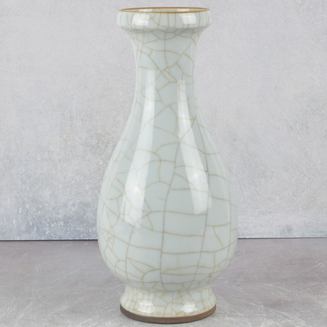 Vintage Chinese Celadon Porcelain: Vintage Longquan Celadon Porcelain Teardrop Vase with a Crackled Ice Finish. Measures: 11-3/4" high, 5" diameter. Kodner Galleries offers phone and absentee bidding at a low, flat 21% buyer’s premiu