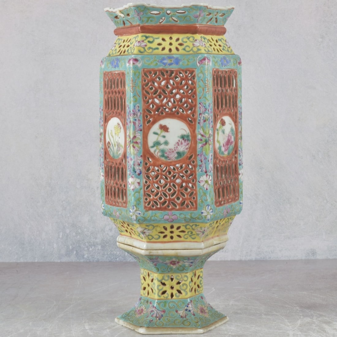 Chinese Porcelain Wedding Lantern: Vintage Chinese Famille Rose Porcelain Two Piece Wedding Lantern in a Hexagon Shape Having a Reticulated Body with Painted Flowers. Measures: 12" high, each side measures: 2-3/4" wide. Kodner Gallerie