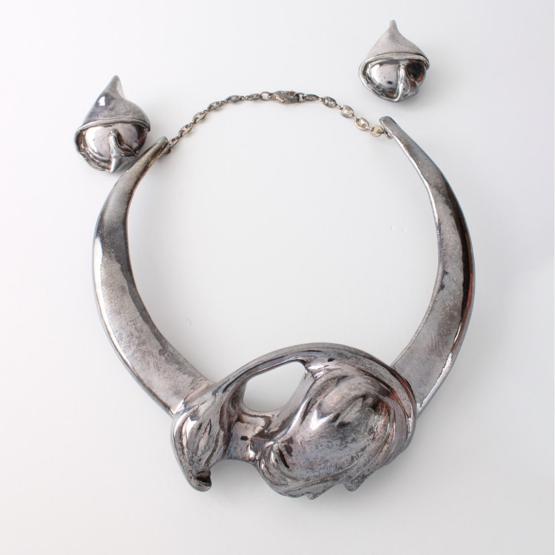 Sterling Necklace and Earrings: Vintage Sterling Silver Choker Necklace and Clip Back Earrings. Each stamped 925. Necklace measures 16" L, earrings measure 1-7/8" L, 1-1/4" W. Approx. gross weight: 120.33 grams. Kodner Galleries off