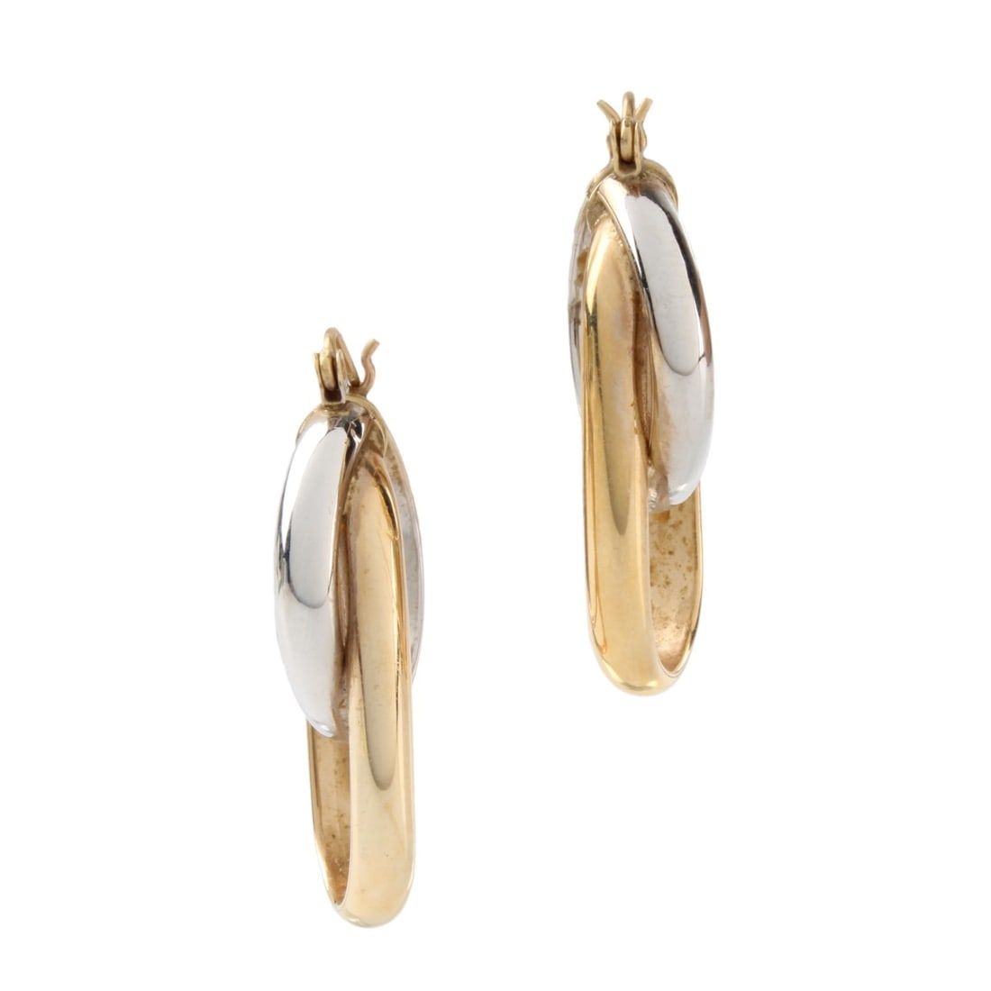 14K Hoop Earrings.: Vintage Modern Hollow 14 Karat Yellow and White Gold Hoop Earrings. Measures 1-1/8" diam. Approx. total weight: 4.29 grams. Kodner Galleries offers phone and absentee bidding at a low, flat 21% buyer�