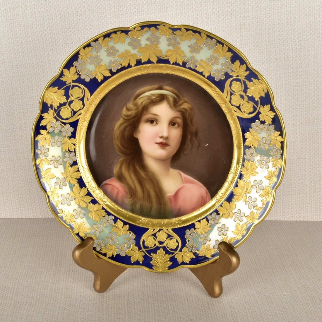 Royal Vienna Portrait Plate: Royal Vienna Portrait Plate "Lilie" Cobalt Blue and Gilt Hand Painted Portrait Plate. Signed Wagner. Marked on the back with the Royal Vienna beehive mark under glaze. Circa 19/20th century.