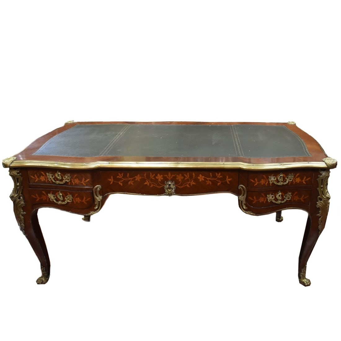 Louis XV Style Bronze Mounted Bureau Plat: Large Mid 20th Century Louis XV Style Gilt-Bronze Mounted Mahogany Bureau Plat. With a serpentine rectangular top inset with a green leather writing surface with gilt-tooled border, within a gilt-bron