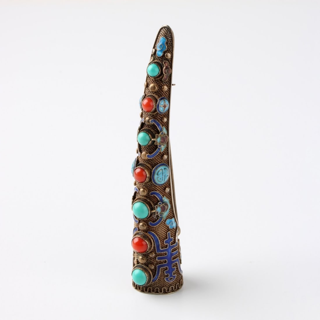 Chinese Silver Nail Guard / Pin: Antique Chinese Filigree Silver Nail Guard / Pin Accented with Enamel and Set with Cabochon Red Coral and Turquoise. Measures 3-1/2" L, 5/8" W. Approx. weight: 13.93 grams. Kodner Galleries offers