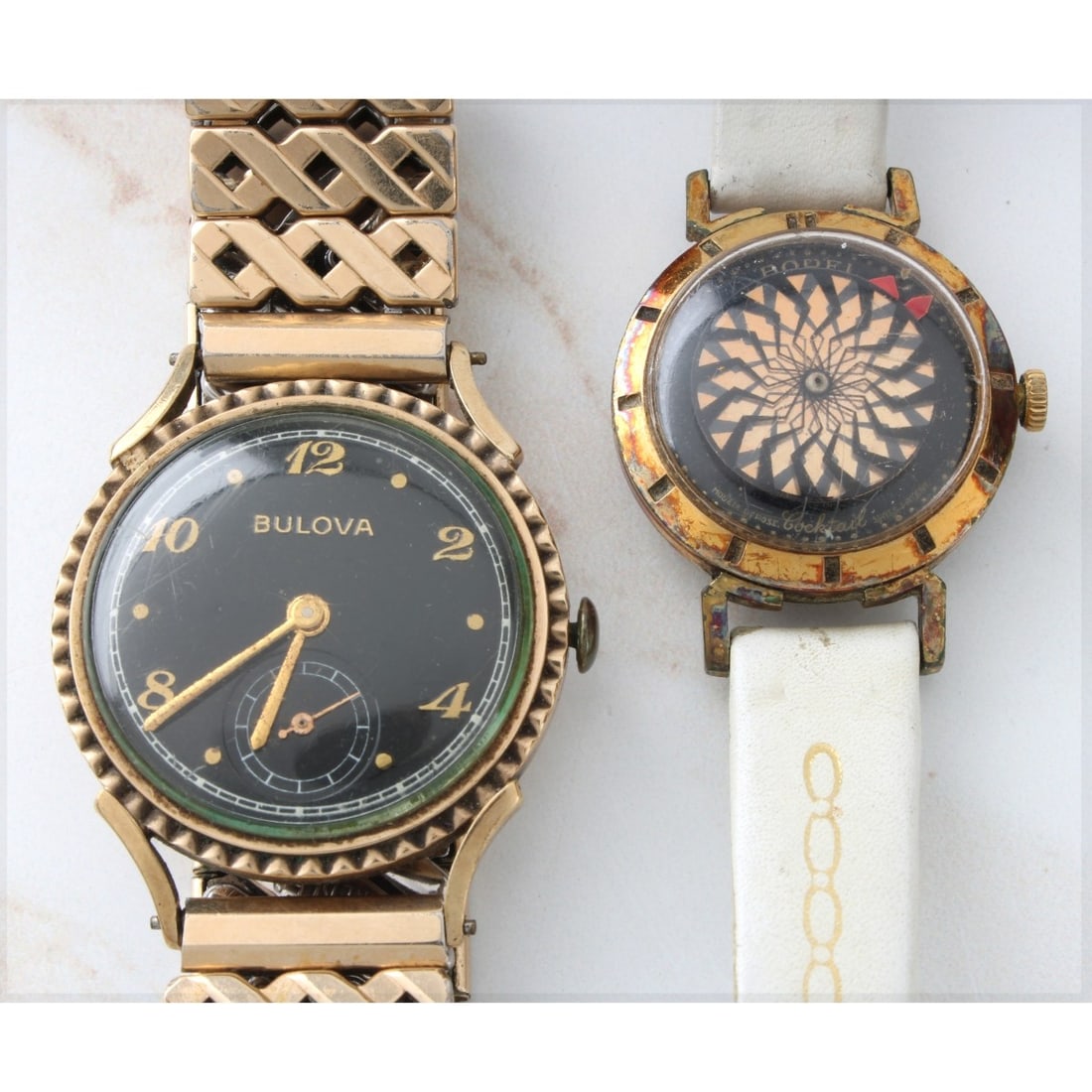 Bulova and Borel Watches: Man's Vintage Bulova Gold Filled Bracelet Watch with Retro Bracelet together with Lady's Borel Gold Tone Metal Watch with Leather Strap Bracelet and Skeleton Case Back. Manual wind movements. Bulova c