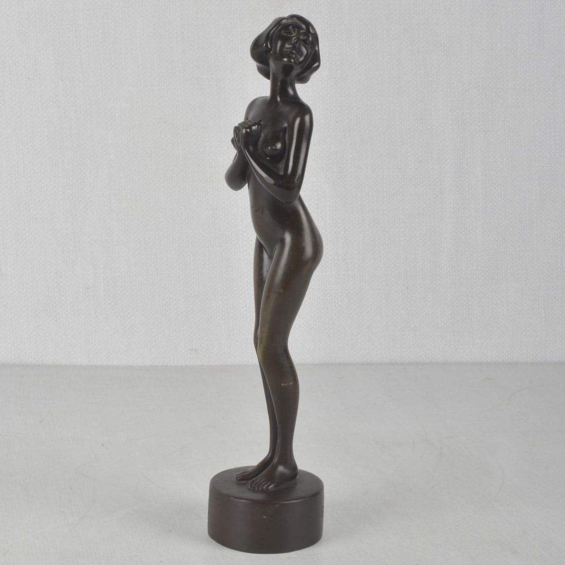 After: Roland Paris: After: Roland Paris, German (1894-1945), Bronze Sculpture, Nude. Bears signature to base. Measures 11-1/2" H, 2-1/2" W (at base). Kodner Galleries offers phone and absentee bidding at a low, flat 21%