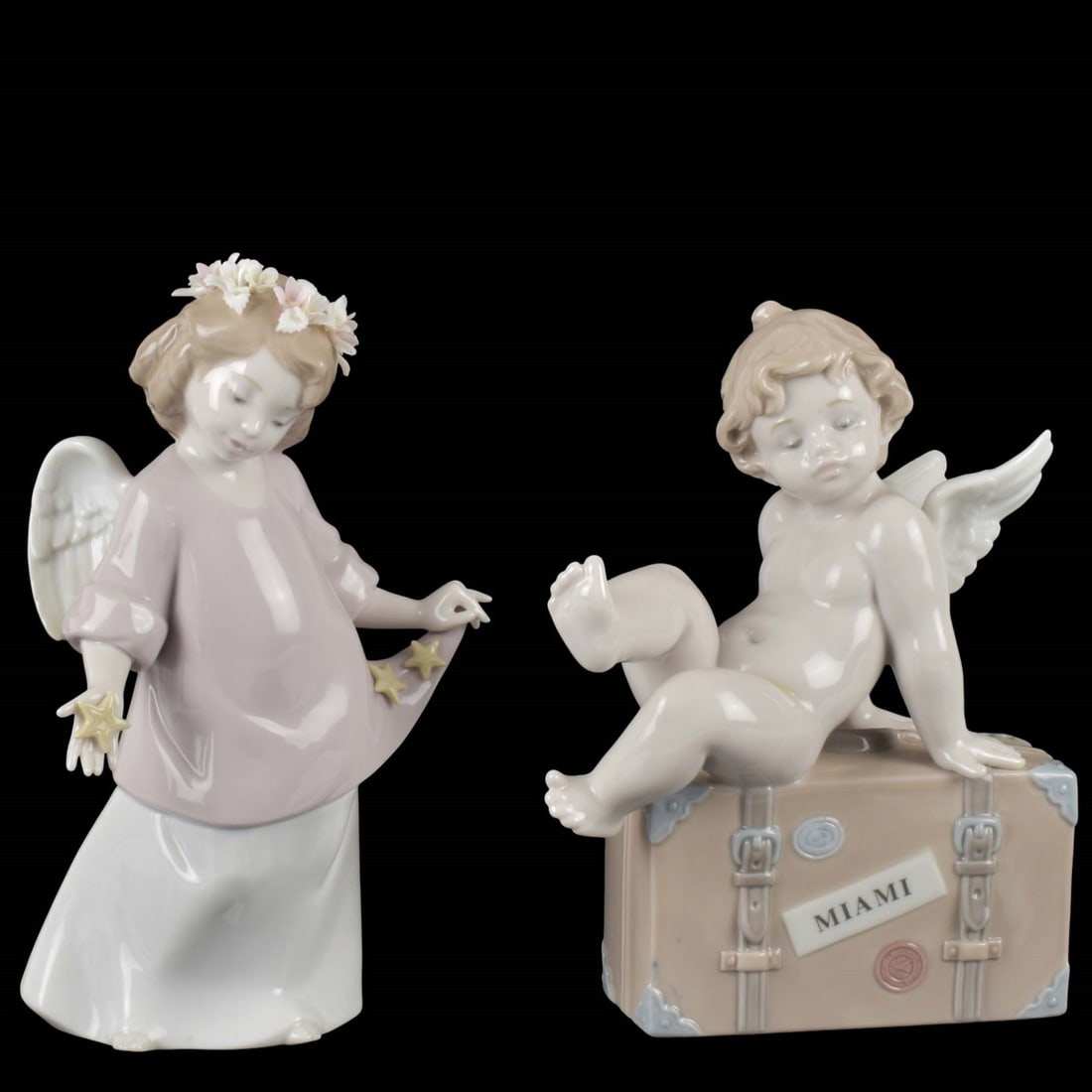 Lladro Porcelain Angel Figures: Two Lladro Porcelain Angel Figures. Signed. standing angel measures 7" H, 4-1/4" W. Kodner Galleries offers phone and absentee bidding at a low, flat 21% buyer’s premium without surcharge or hidden