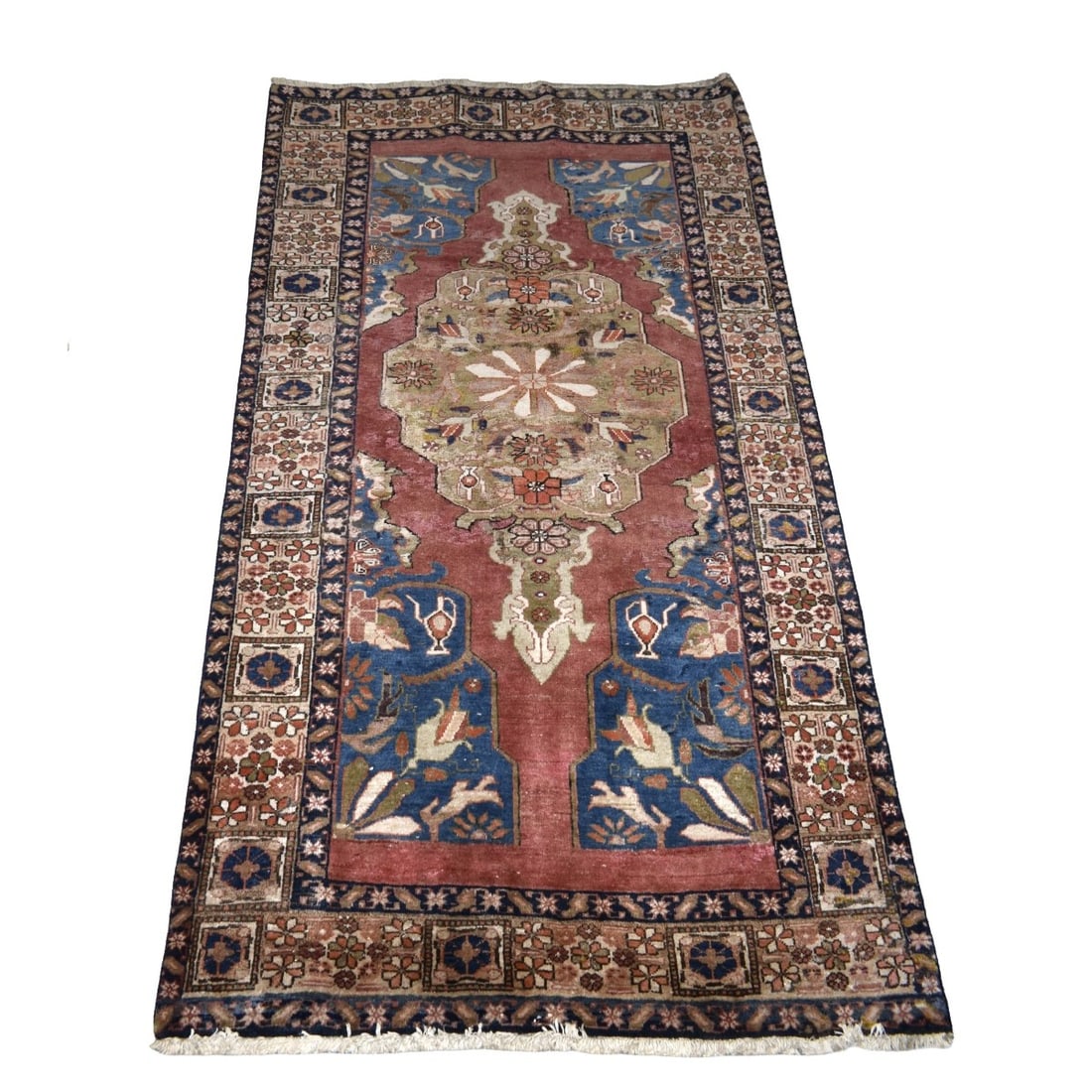 Vintage Persian Heriz Tribal Rug: Vintage Persian Heriz Tribal Rug. Measures: 92" x 49" Kodner Galleries offers phone and absentee bidding at a low, flat 21% buyer’s premium without surcharge or hidden fees. For information, please
