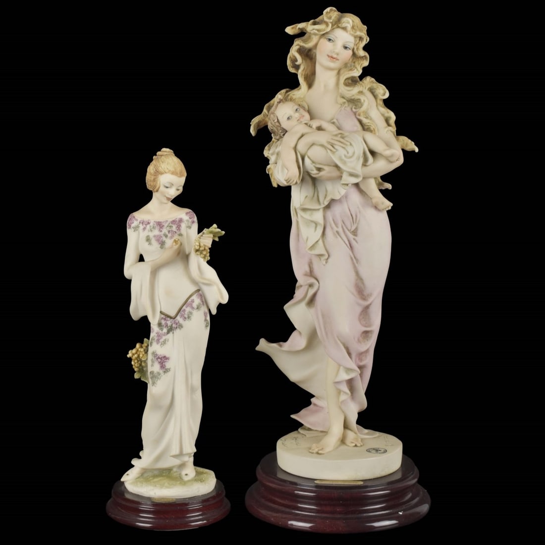 Giuseppe Armani Figurines: Two (2) Giuseppe Armani Figurines. One (1) "Maternity" Events Figure 1993, figure measures: 13-1/2" high, 4-1/3" wide, 3-1/2" deep, one (1) "Arianna" 1996 figure, measures: 9-1/2" high, 3' wide,