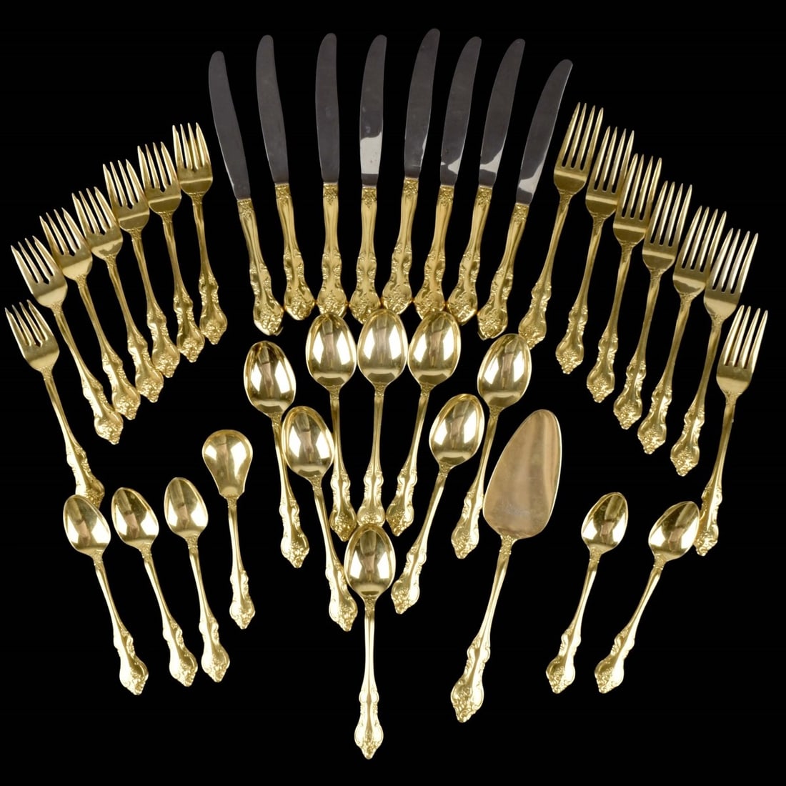 Lot of Gold Plated Dinner Service: Thirty-seven (37) Pieces Gold Plated Dinner Service. Consisting of 7 dinner forks, measures: 7-3/4" long, 7 salad forks, measures: 6-7/8" long, 8 dinner knives, measures: 9" long, 8 soup spoons, measu