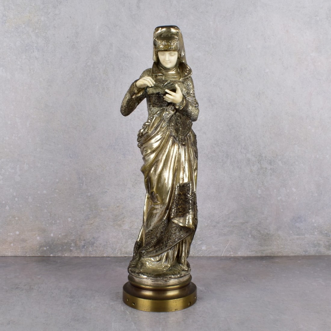 Albert Carrier Belleuse, French (1824-1887): Albert Carrier Belleuse, French (1824-1887) Silvered Bronze Figurine of a Woman "La Liseuse" (The Reader), Signed on Base. Measures: 13" H. We Will Not Ship This Item Outside of the State of Florida.