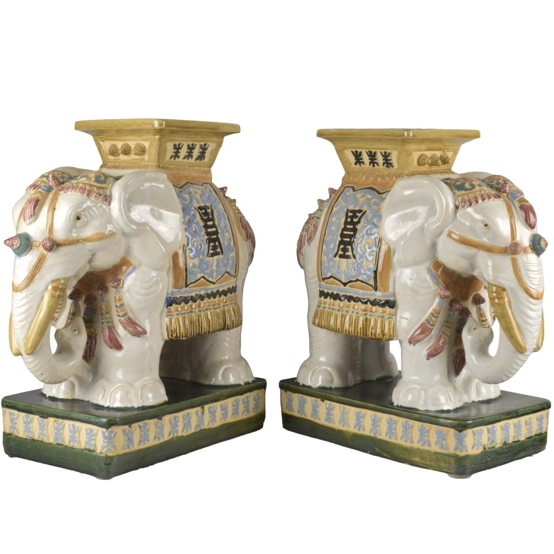 Vintage Chinese Plant Stands: Two (2) Vintage Chinese Glazed Porcelain Plant Stands in the Form of Standing Elephants. Measures: 22-1/4" high, 19" long, 11" wide. Kodner Galleries offers phone and absentee bidding at a low, flat