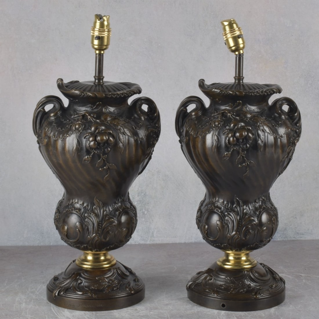 Henry Dasson, French (1825-1896): Henry Dasson, French (1825-1896), Pair of 19th Century Patinated Bronze Urns now mounted as Lamps. Signed and dated 1881 to base. Measure 13-1/2" H, 8" W. Kodner Galleries offers phone and absentee