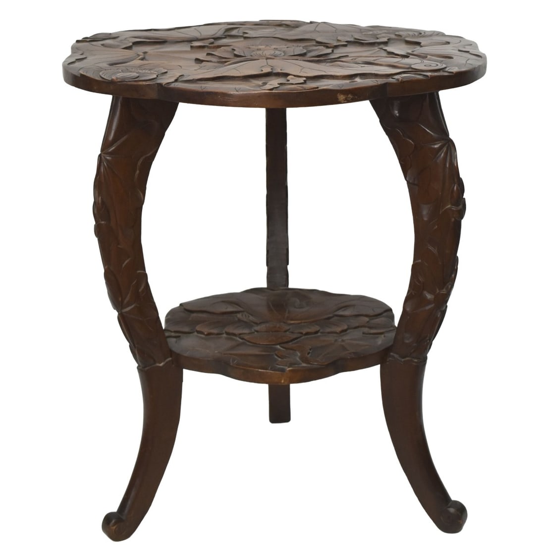 Art Nouveau Style Side Table: Chinese Art Nouveau Style Carved Floral Side Table with Lotus Blossom Decoration and One (1) Lower Shelf. Measures: 23" high, 20" diameter. Kodner Galleries offers phone and absentee bidding at a
