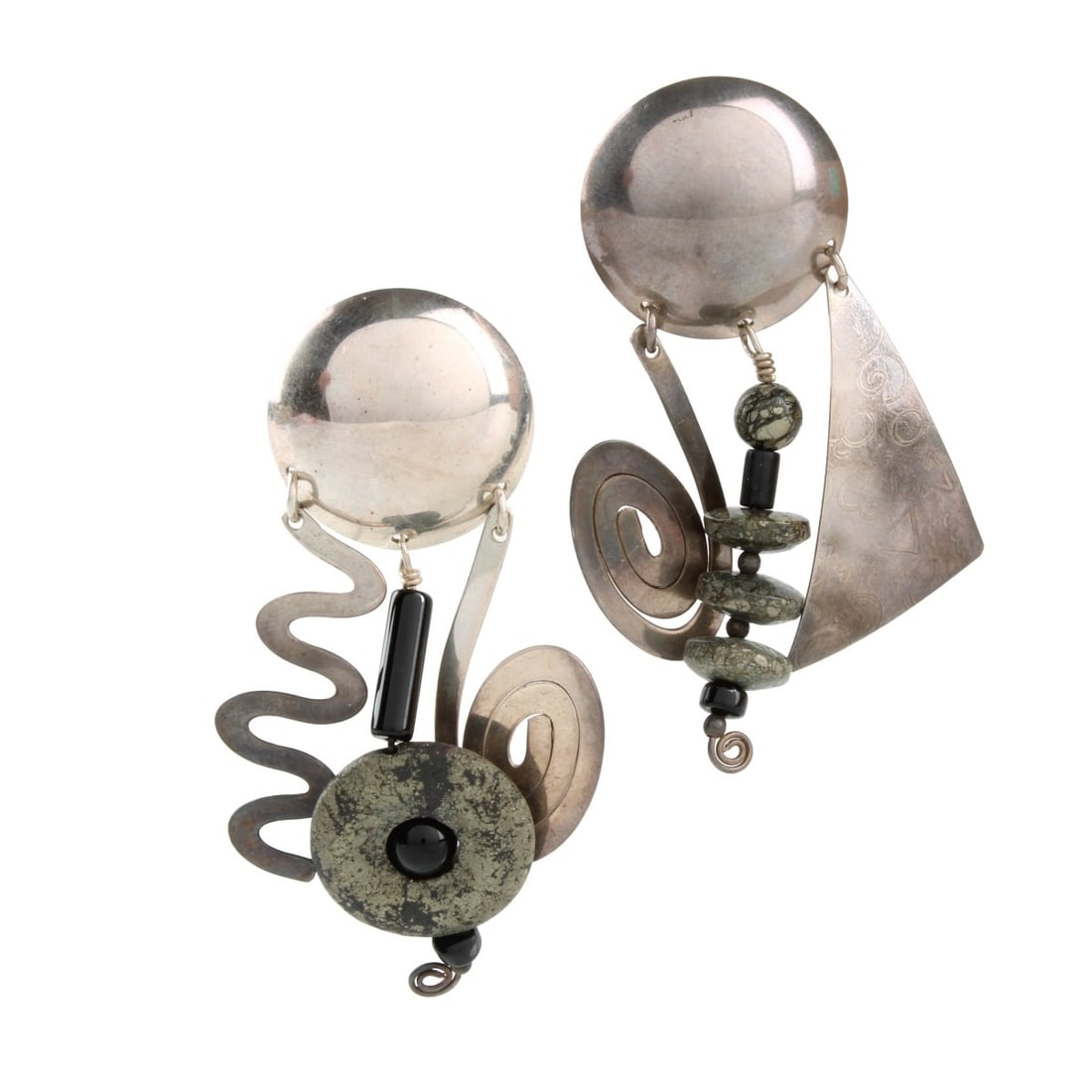 B. Sucherman Sterling Earrings: Vintage Barbara Sucherman Signed Black Onyx and Sterling Silver Pendant Earrings. Stamped Sterling. Measure 2-1/2" L, 1-1/2" W. Approx. total weight: 19.47 grams. Kodner Galleries offers phone and