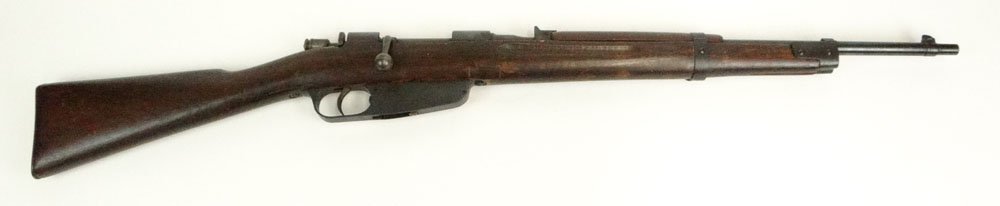 6.5 Caliber Italian Army Carcano Rifle Model 41 WWII: 6.5 Caliber Italian Army Carcano Rifle Model 41 WWII Bolt Action Rifle. The Carcano rifle was the standard weapon of the Italian Army. Signed 1940, XVIII, Made in Italy, and BX8136. Good Condition. Me